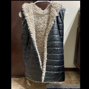 Vest Size Small. Missing tags.